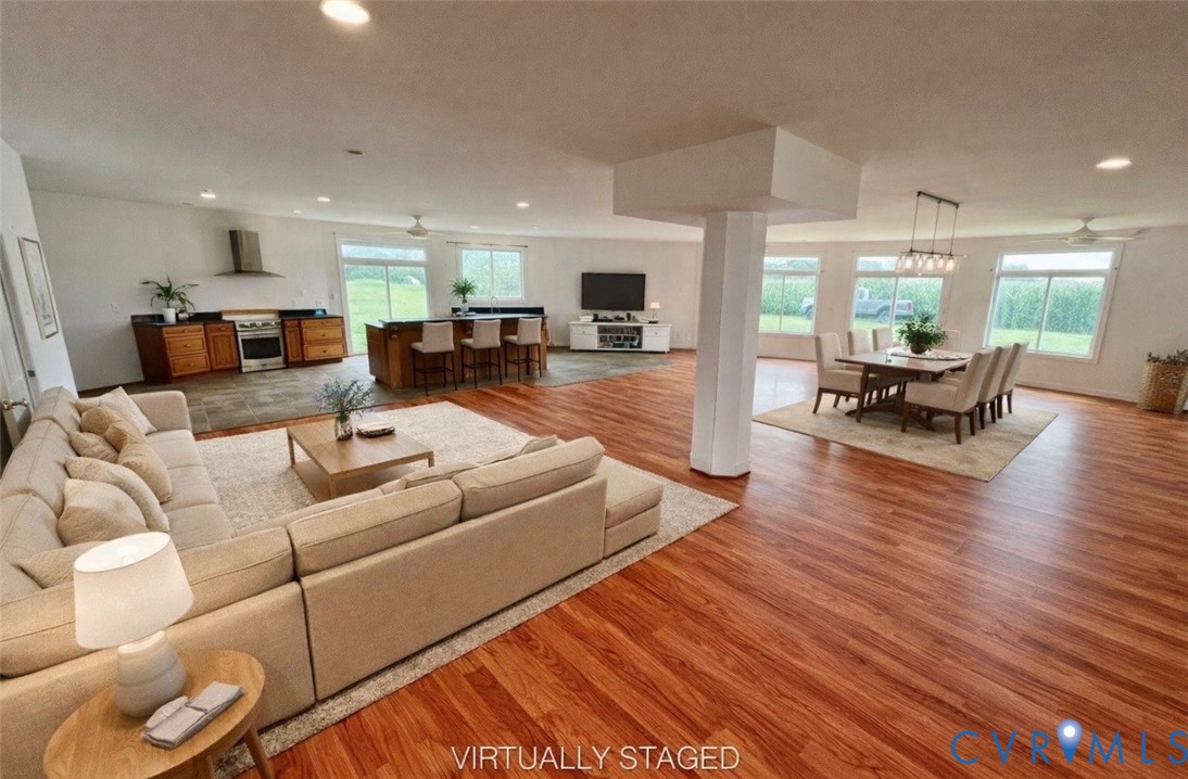 395 Kinsale Creek Road Kinsale, VA 22488 - Photo 7 of 41 a living room with furniture and a wooden floor
