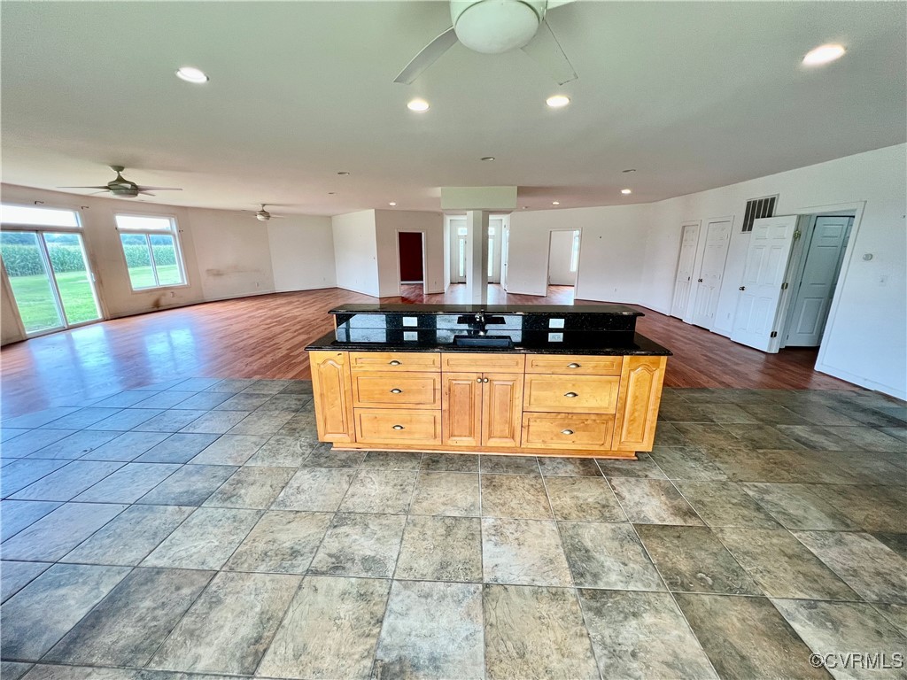 395 Kinsale Creek Road Kinsale, VA 22488 - Photo 10 of 41 a kitchen with stainless steel appliances granite countertop a sink and cabinets