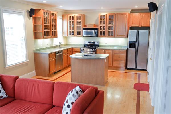 141-143 M Street, Unit 2 Boston, MA 02127 - Photo 1 of 15 a living room with stainless steel appliances granite countertop furniture and a kitchen view