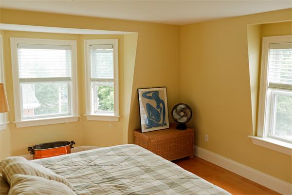 141-143 M Street, Unit 2 Boston, MA 02127 - Photo 12 of 15 a bedroom with a bed and a window