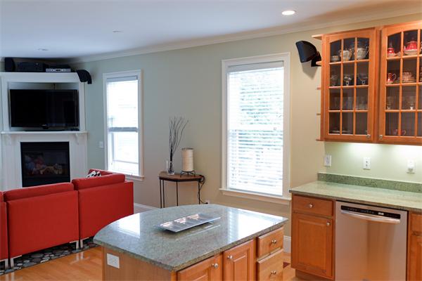 141-143 M Street, Unit 2 Boston, MA 02127 - Photo 3 of 15 a living room with furniture fireplace and flat screen tv