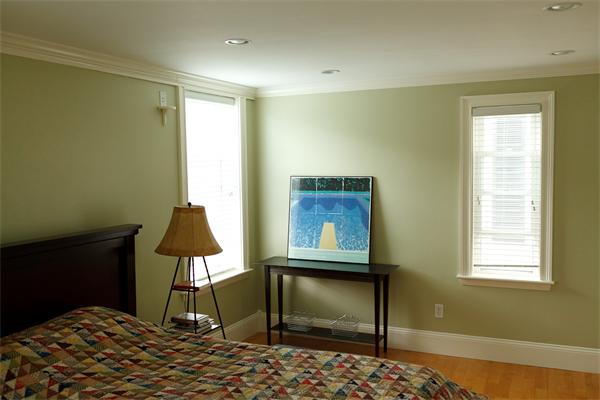 141-143 M Street, Unit 2 Boston, MA 02127 - Photo 9 of 15 a living room with a table and a chair