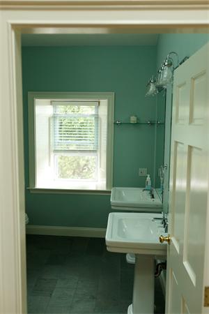 141-143 M Street, Unit 2 Boston, MA 02127 - Photo 10 of 15 a bathroom with a sink a toilet and shower