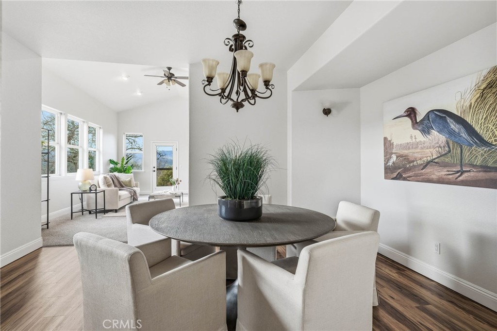 19429 Moon Ridge Road Hidden Valley Lake, CA 95467 - Photo 14 of 75 a view of a dining room with furniture window and wooden floor