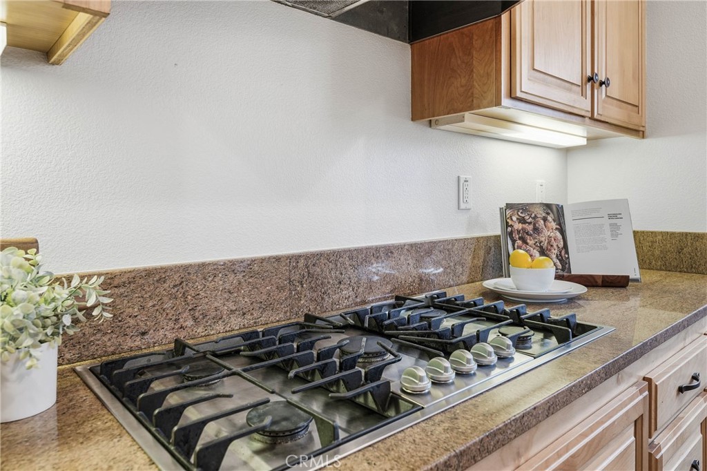 19429 Moon Ridge Road Hidden Valley Lake, CA 95467 - Photo 21 of 75 a stove top oven sitting inside of a kitchen