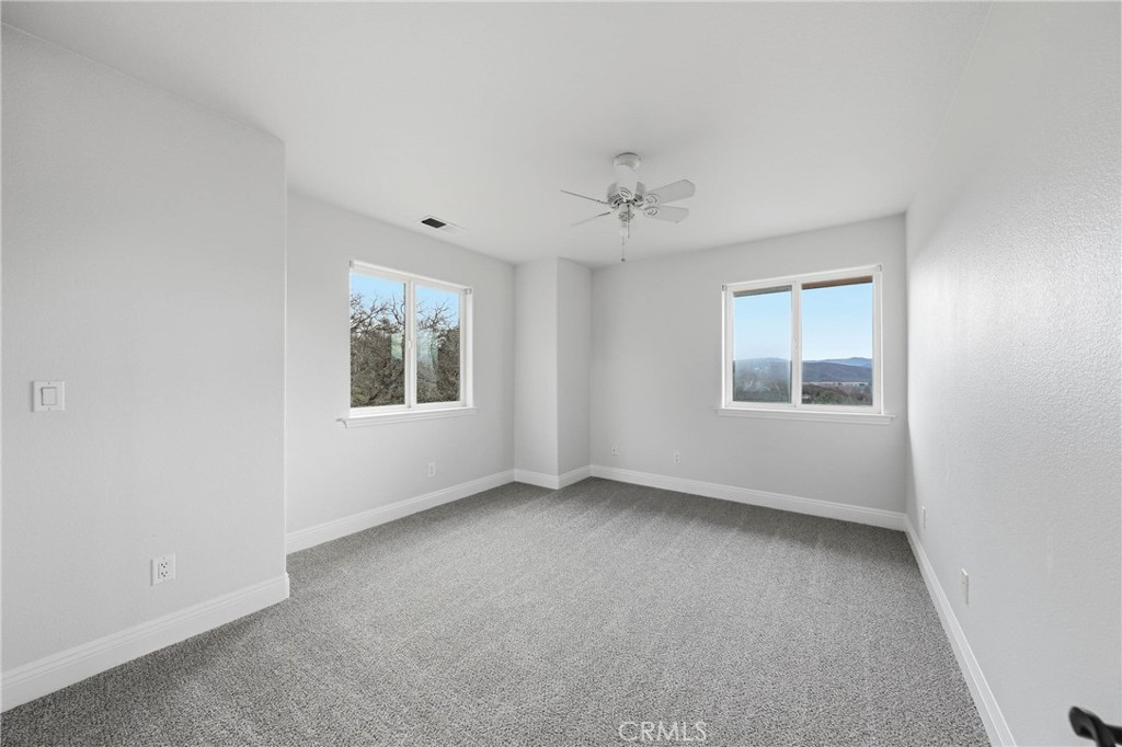 19429 Moon Ridge Road Hidden Valley Lake, CA 95467 - Photo 29 of 75 a view of an empty room with a window