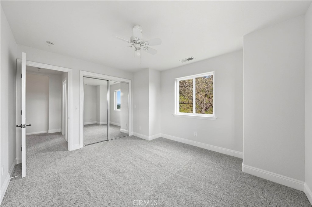 19429 Moon Ridge Road Hidden Valley Lake, CA 95467 - Photo 30 of 75 a view of an empty room with a window