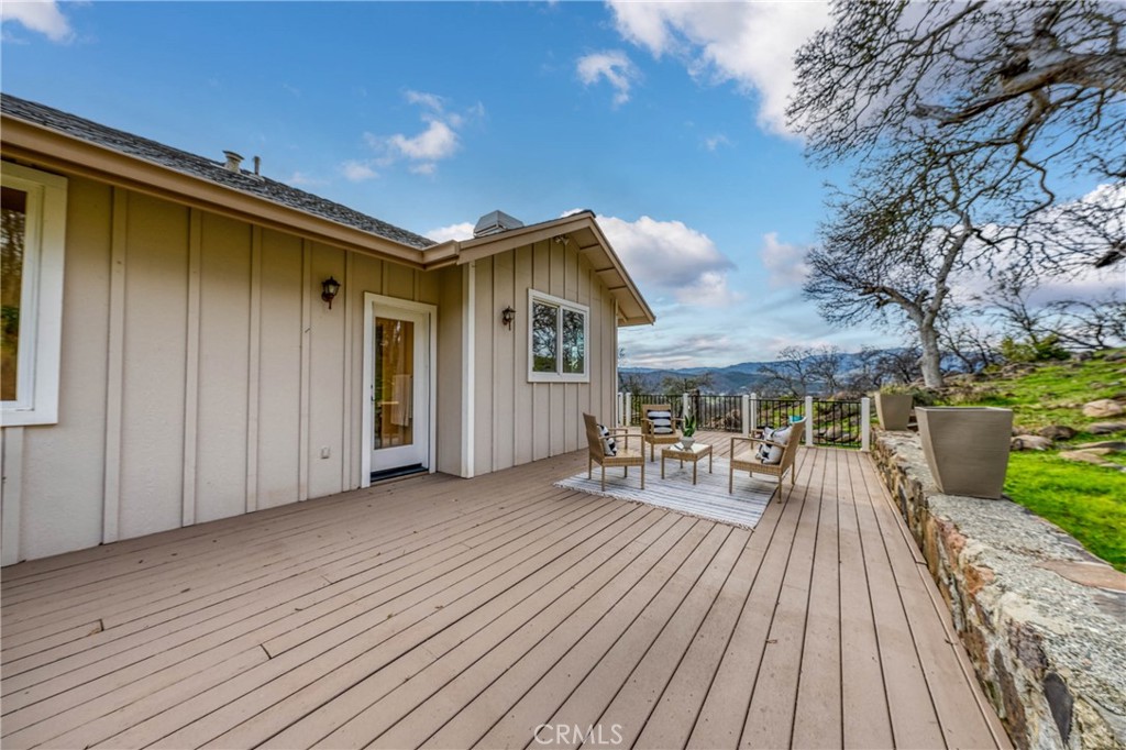 19429 Moon Ridge Road Hidden Valley Lake, CA 95467 - Photo 52 of 75 a view of backyard with a deck and wooden floor