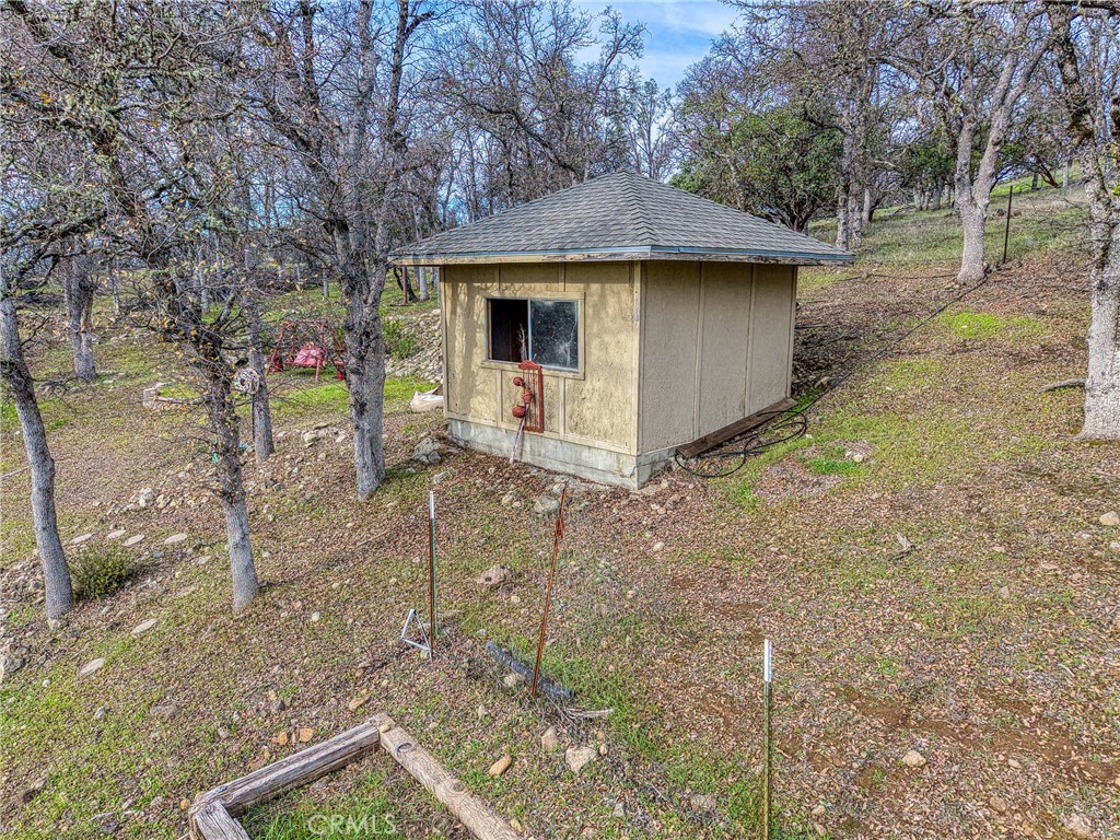 19429 Moon Ridge Road Hidden Valley Lake, CA 95467 - Photo 58 of 75 a view of a house with a yard