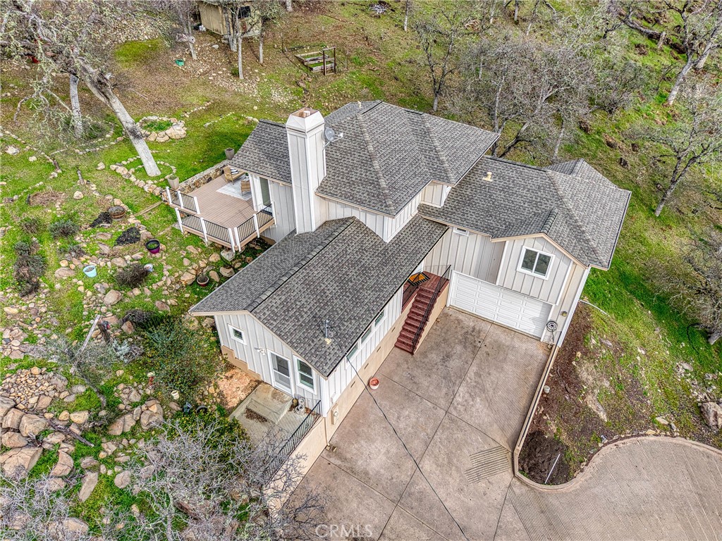 19429 Moon Ridge Road Hidden Valley Lake, CA 95467 - Photo 8 of 75 an aerial view of a house with swimming pool and outdoor space
