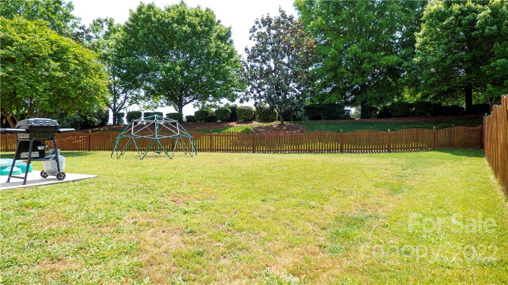 3303 Burnage Hall Road Harrisburg, NC 28075 - Photo 31 of 37 a view of a swimming pool with a patio