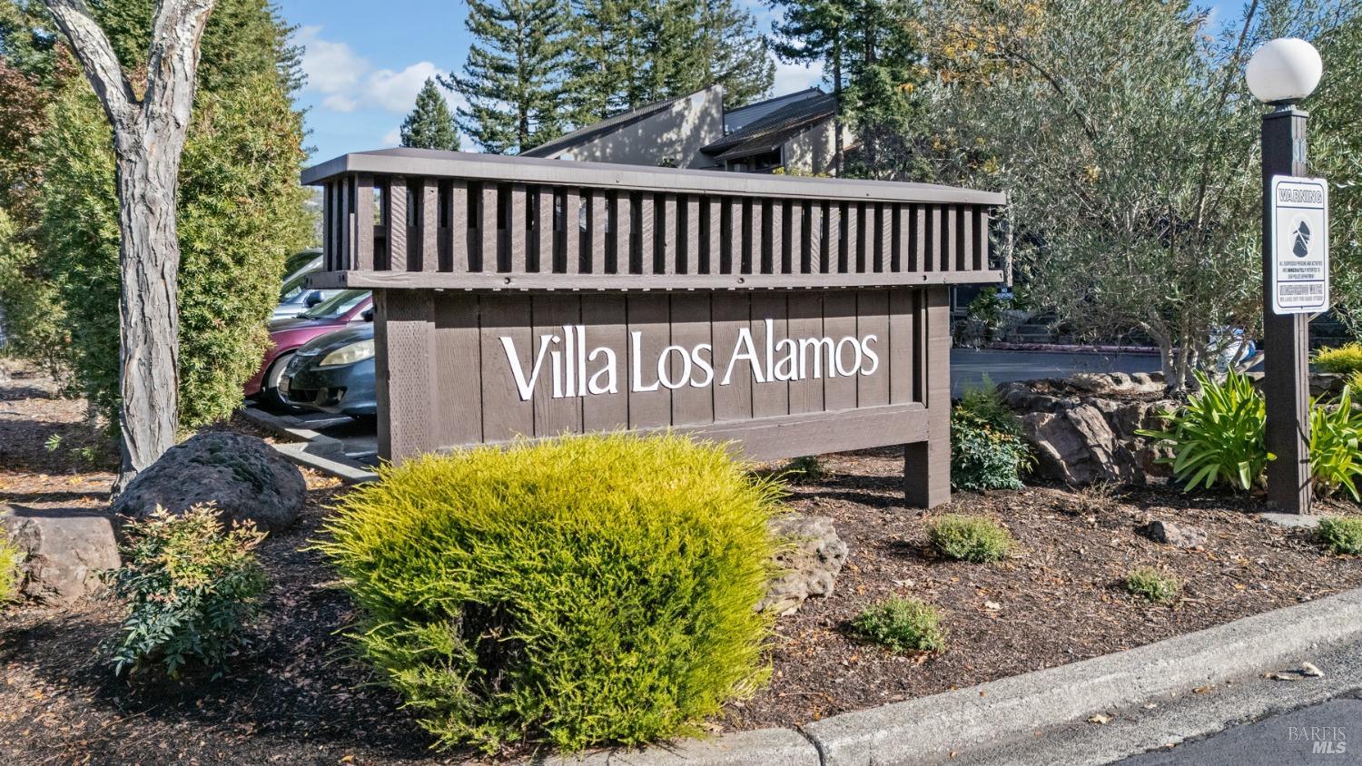300 Los Alamos Road, Unit 306 Santa Rosa, CA 95409 - Photo 1 of 1 a view of a backyard with a deck