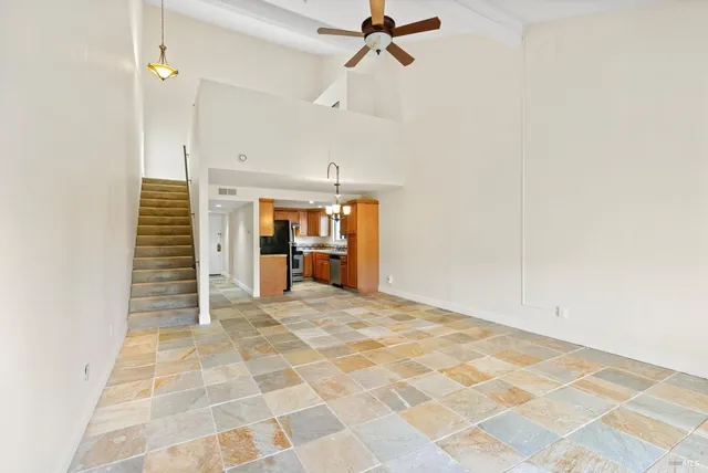 a view of a room with a barbeque and entryway