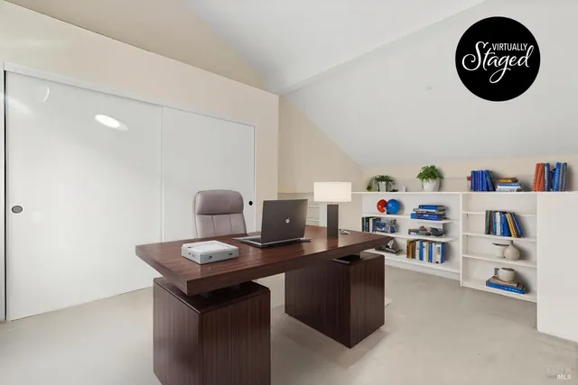 a view of workspace with cabinets