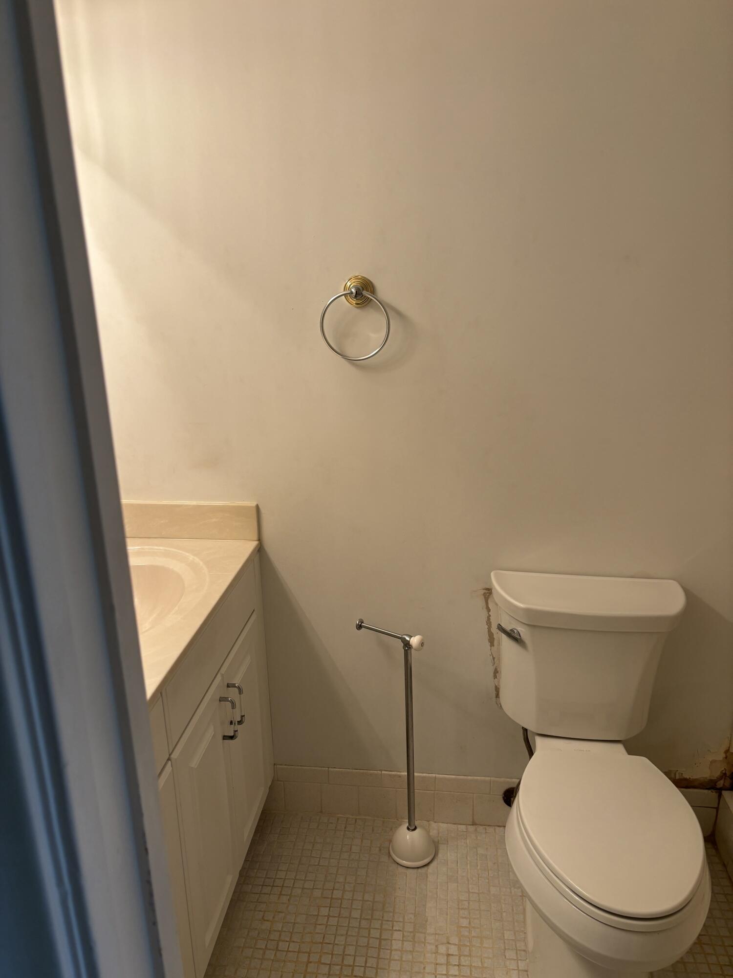 1700 Dover Road, Unit 215A Delray Beach, FL 33445 - Photo 11 of 23 a bathroom with a toilet and a shower