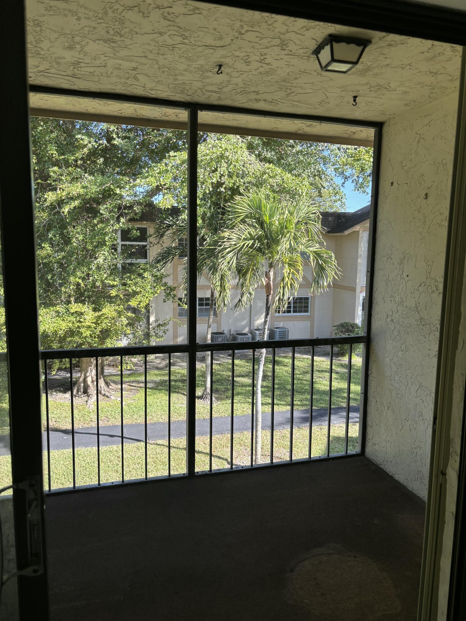 1700 Dover Road, Unit 215A Delray Beach, FL 33445 - Photo 18 of 23 a view of a large window