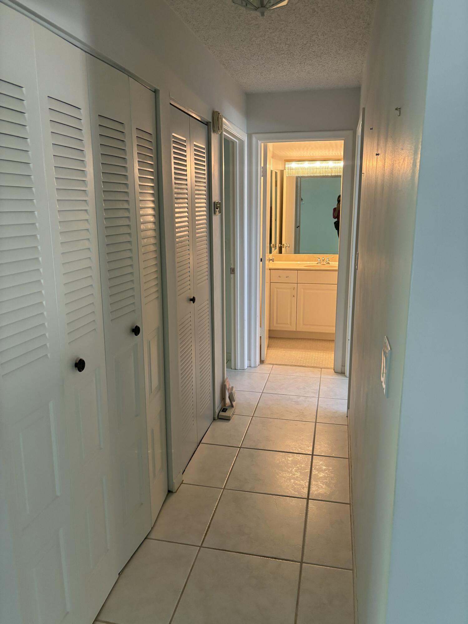 1700 Dover Road, Unit 215A Delray Beach, FL 33445 - Photo 8 of 23 a view of empty room with a bathroom