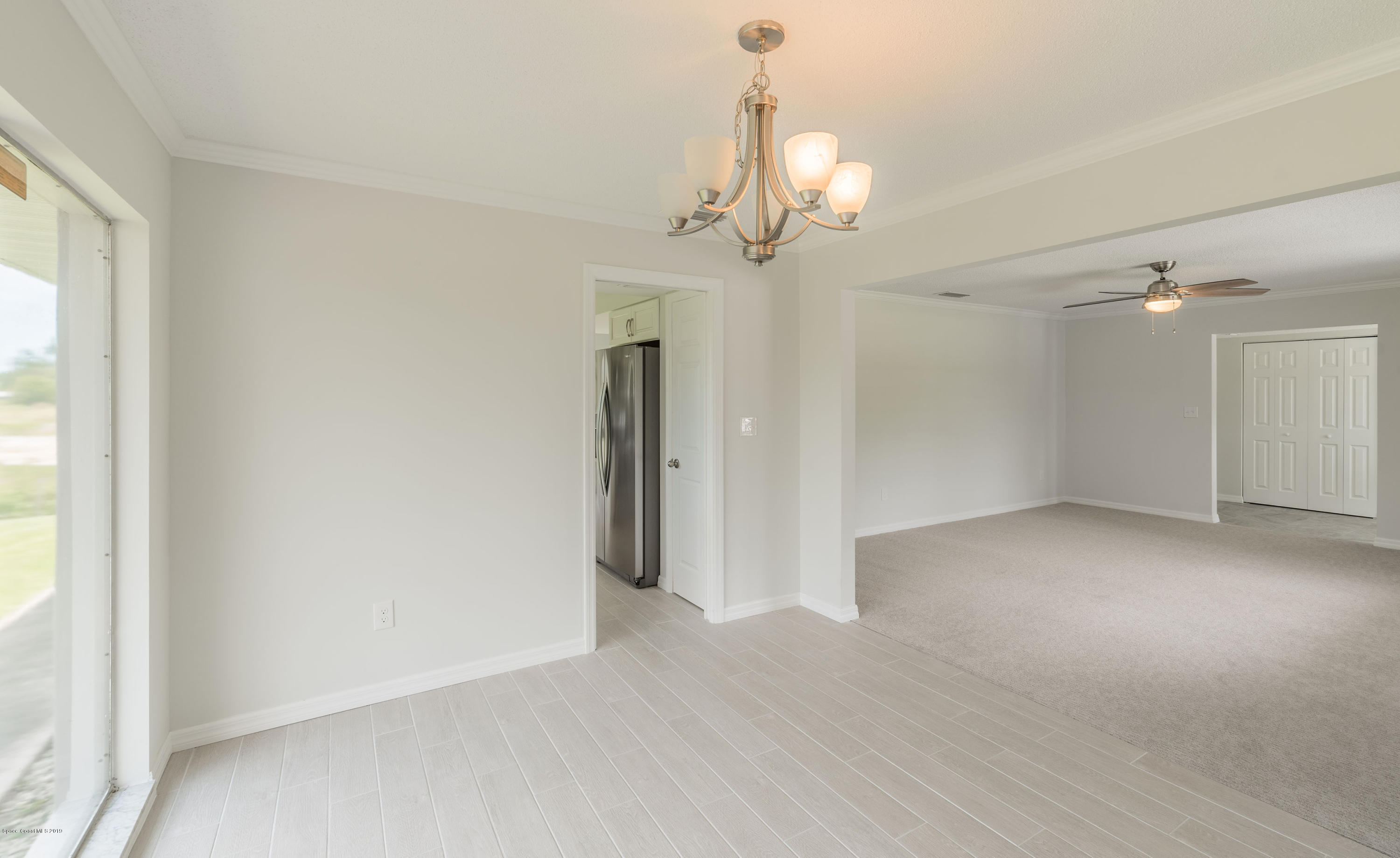 1449 Meadowbrook Road Northeast Palm Bay, FL 32905 - Photo 12 of 34 Dining Room