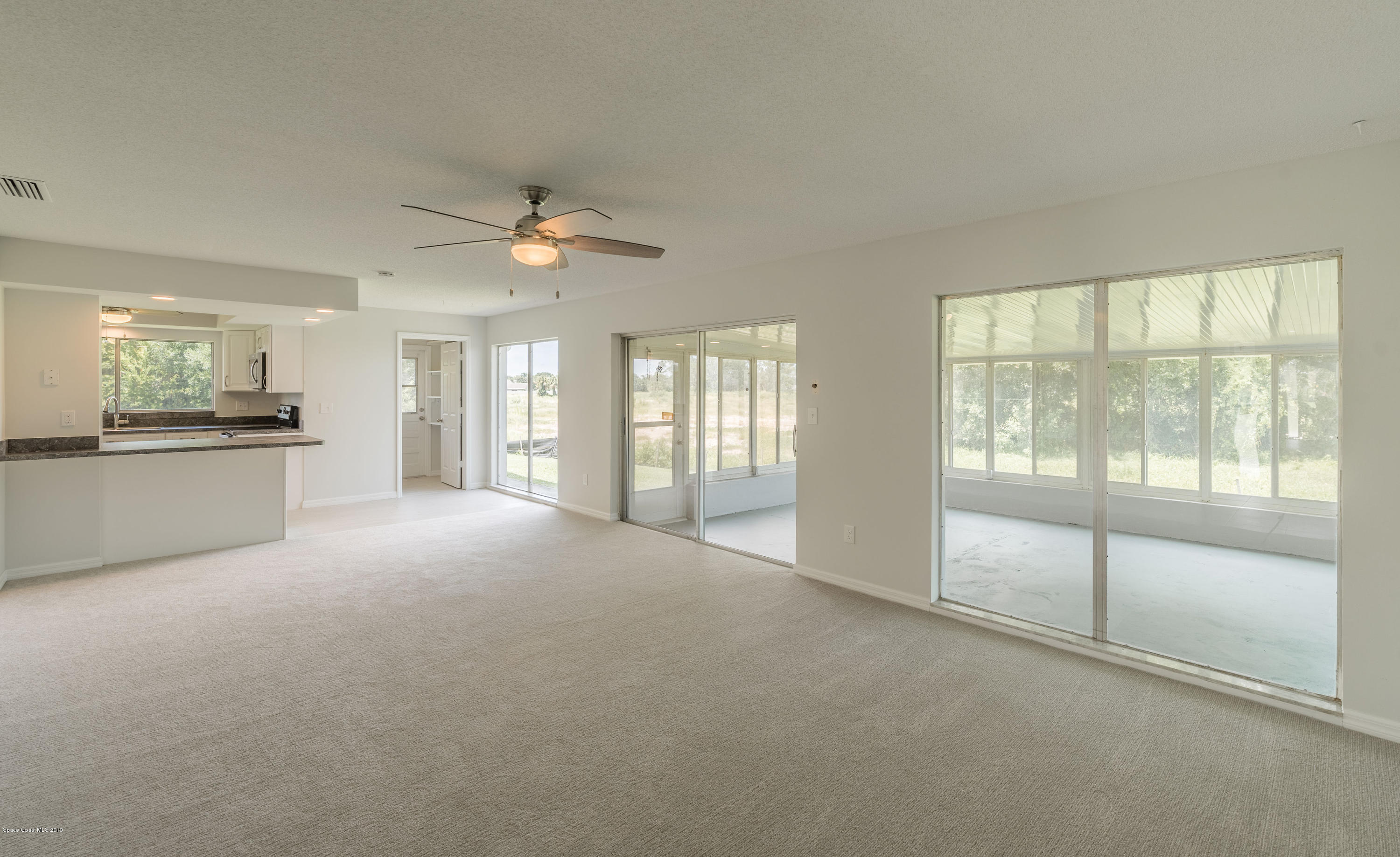 1449 Meadowbrook Road Northeast Palm Bay, FL 32905 - Photo 15 of 34 Family Room