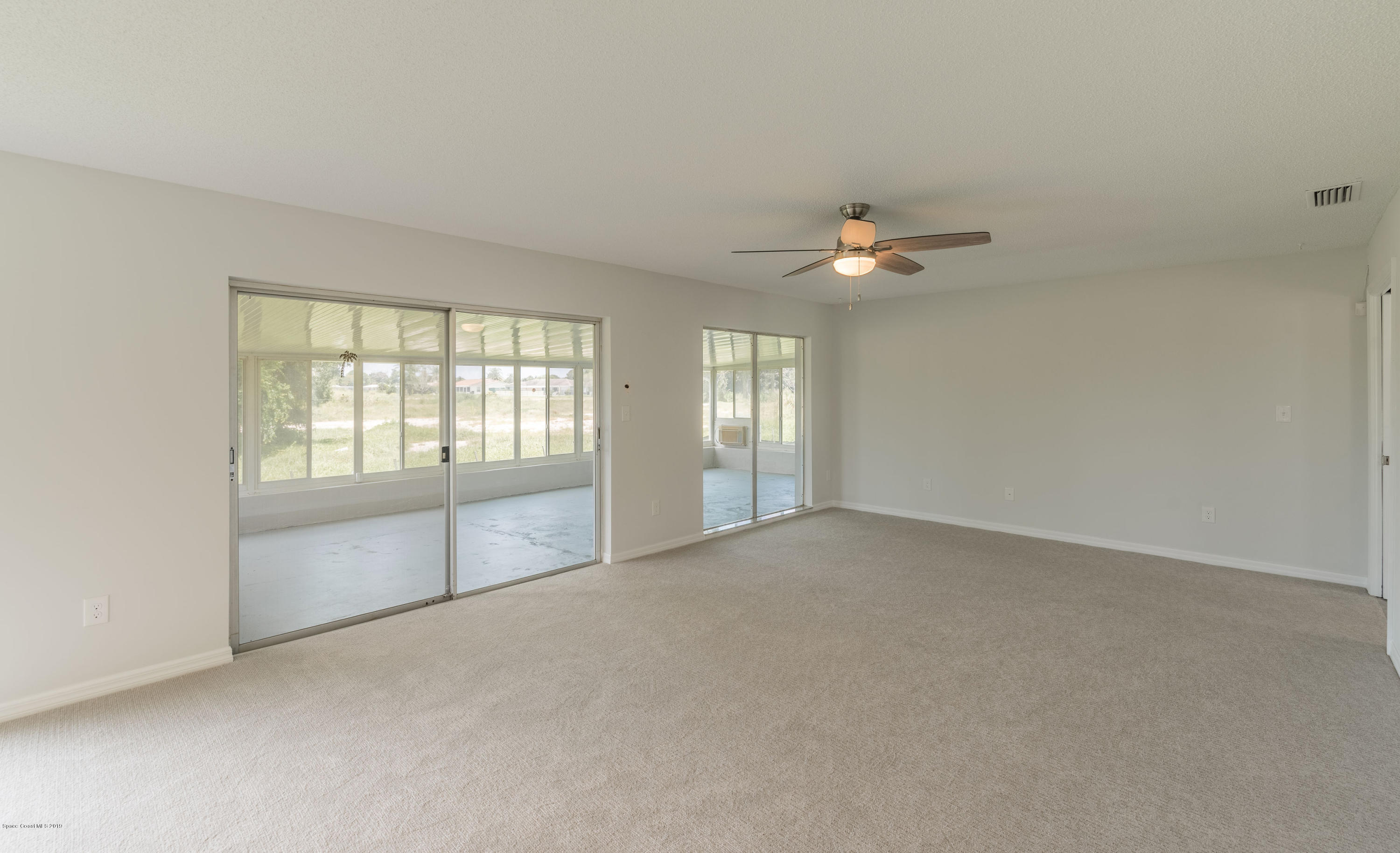 1449 Meadowbrook Road Northeast Palm Bay, FL 32905 - Photo 17 of 34 Family Room