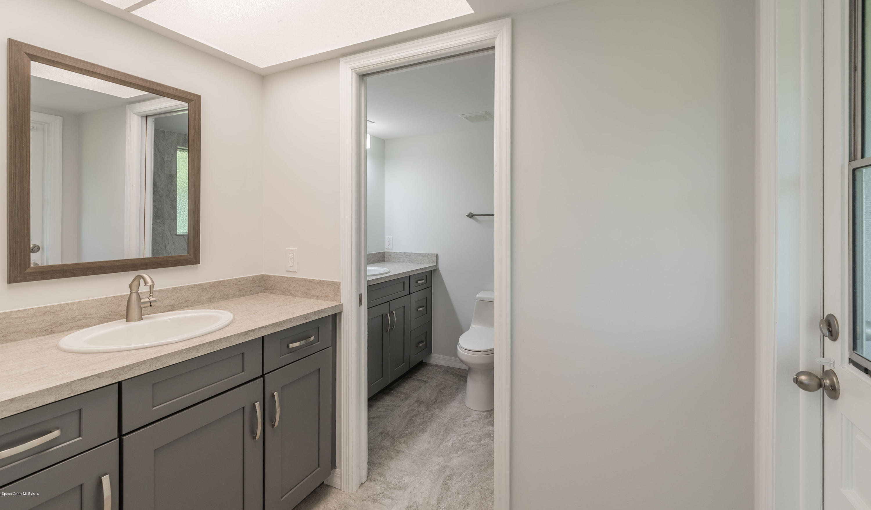 1449 Meadowbrook Road Northeast Palm Bay, FL 32905 - Photo 20 of 34 Master Bath