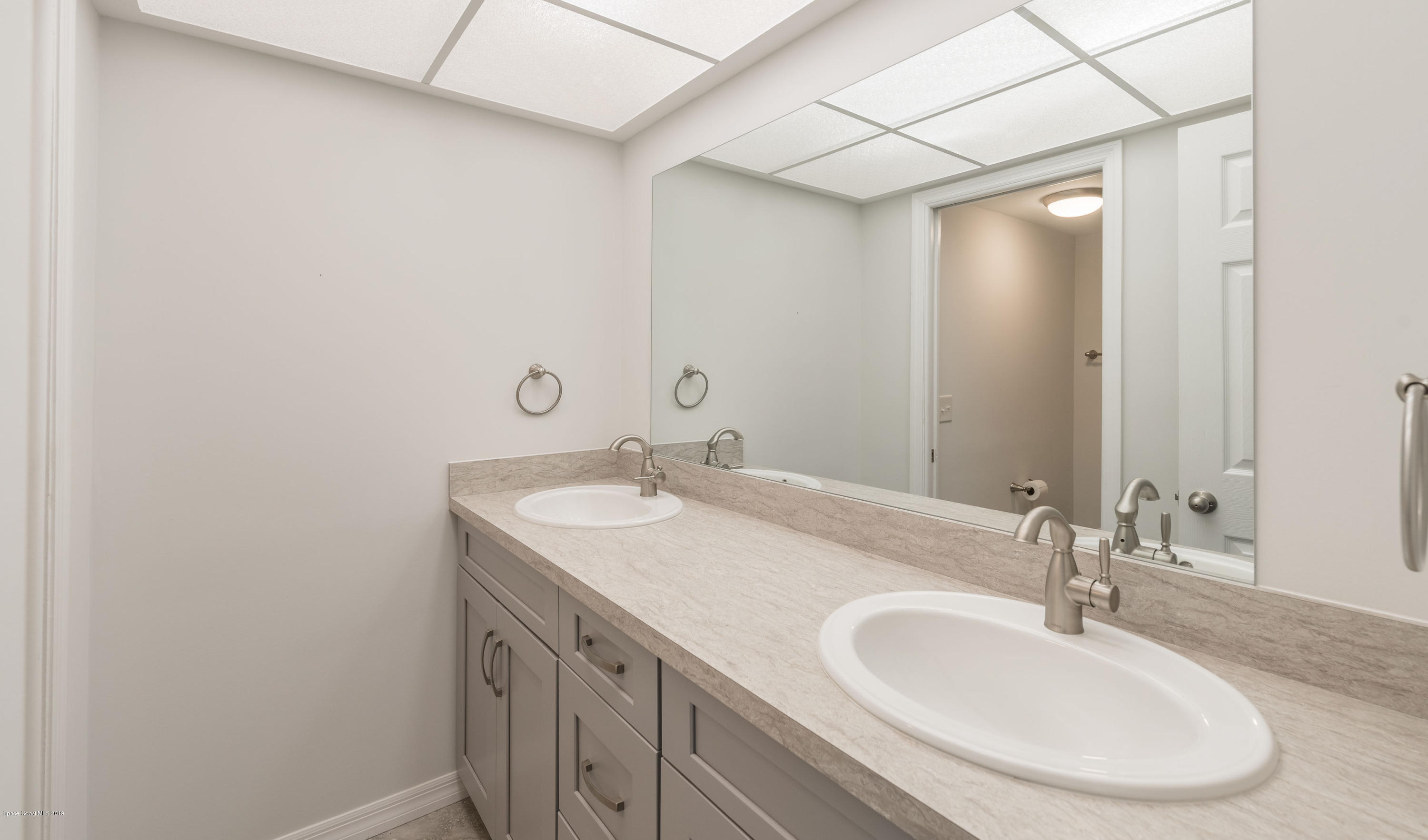 1449 Meadowbrook Road Northeast Palm Bay, FL 32905 - Photo 22 of 34 Guest Bath