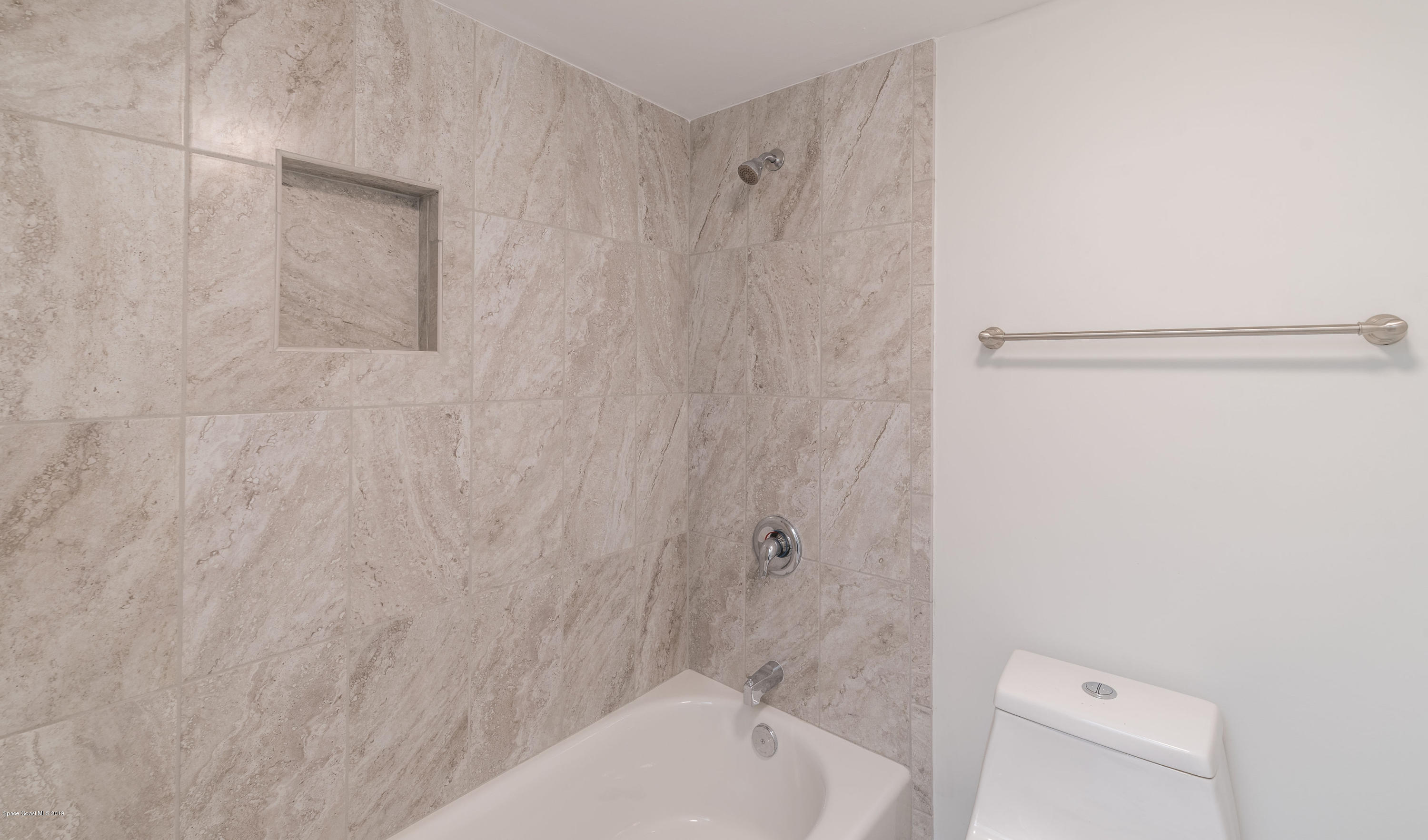 1449 Meadowbrook Road Northeast Palm Bay, FL 32905 - Photo 23 of 34 Guest Bath