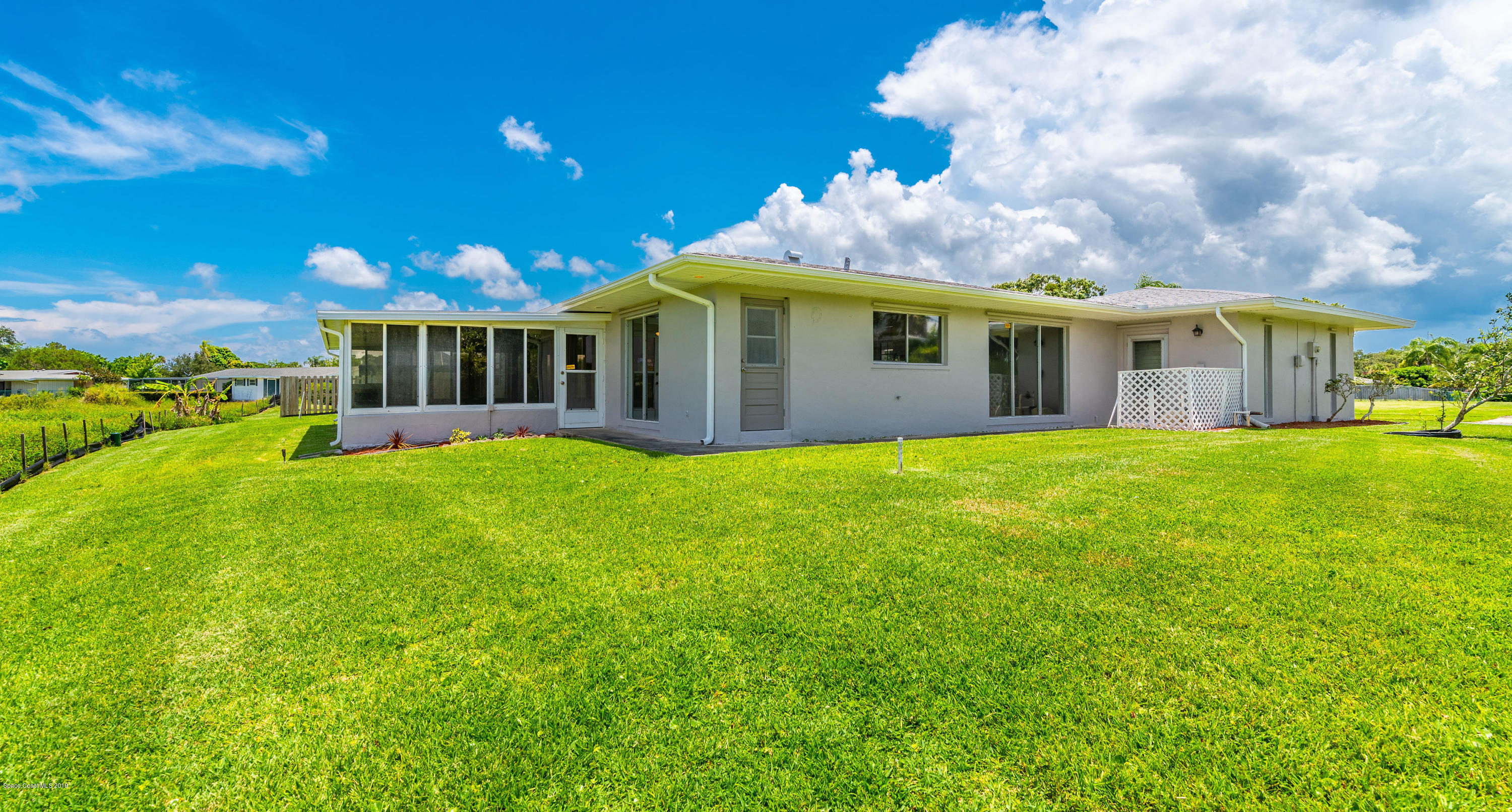 1449 Meadowbrook Road Northeast Palm Bay, FL 32905 - Photo 29 of 34 Backyard