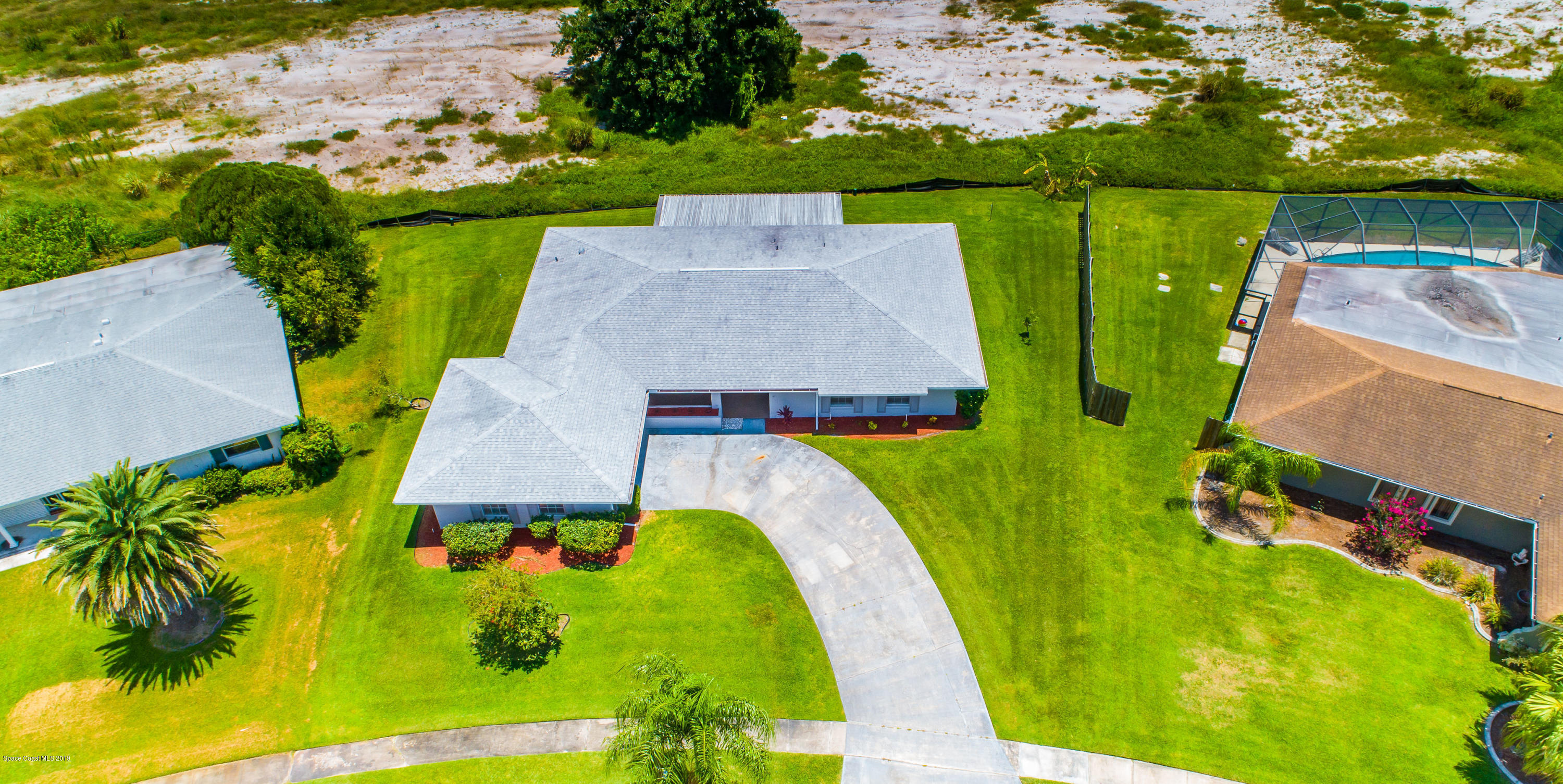 1449 Meadowbrook Road Northeast Palm Bay, FL 32905 - Photo 31 of 34 Front Aerial