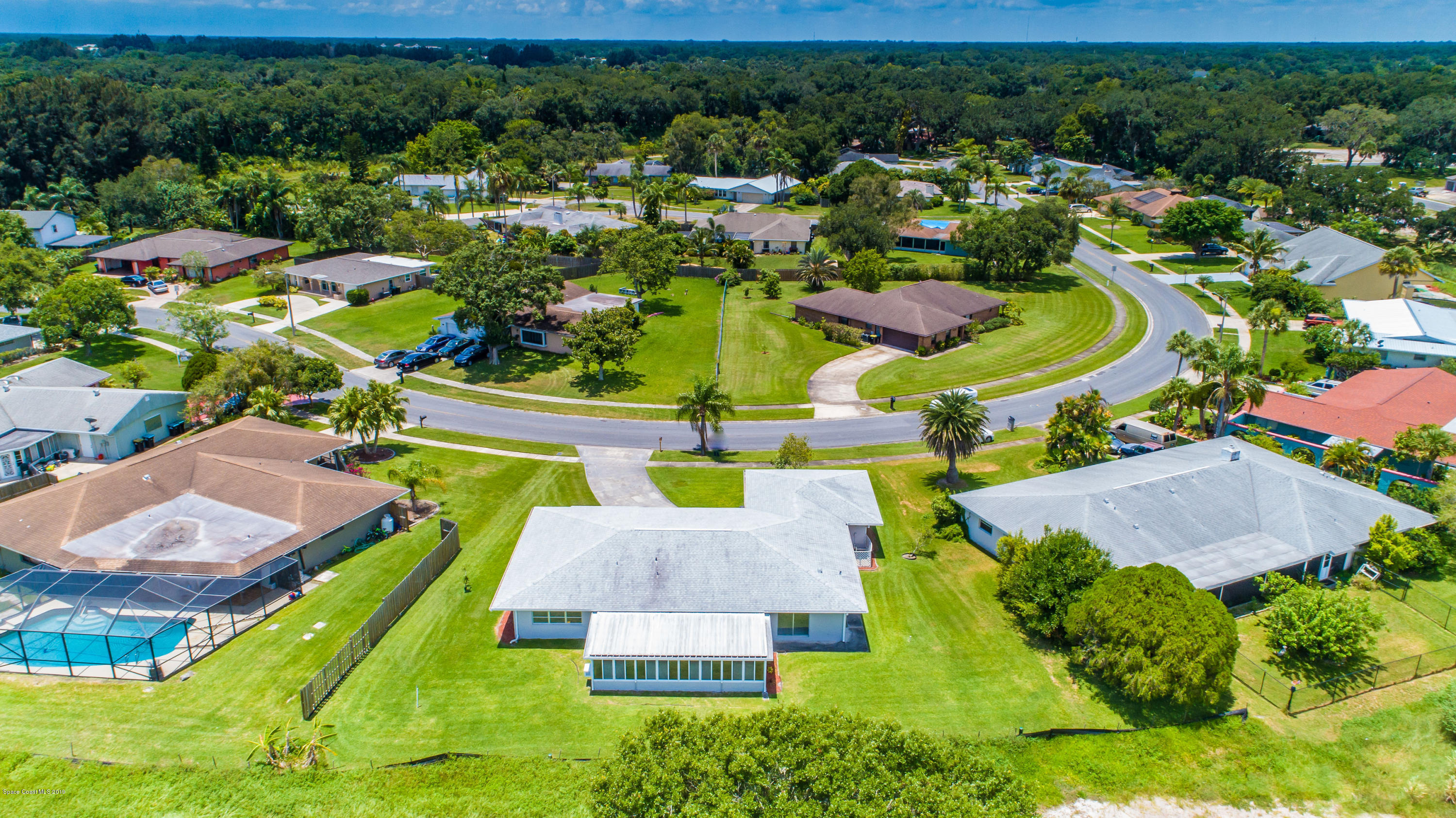 1449 Meadowbrook Road Northeast Palm Bay, FL 32905 - Photo 33 of 34 Back Aerial