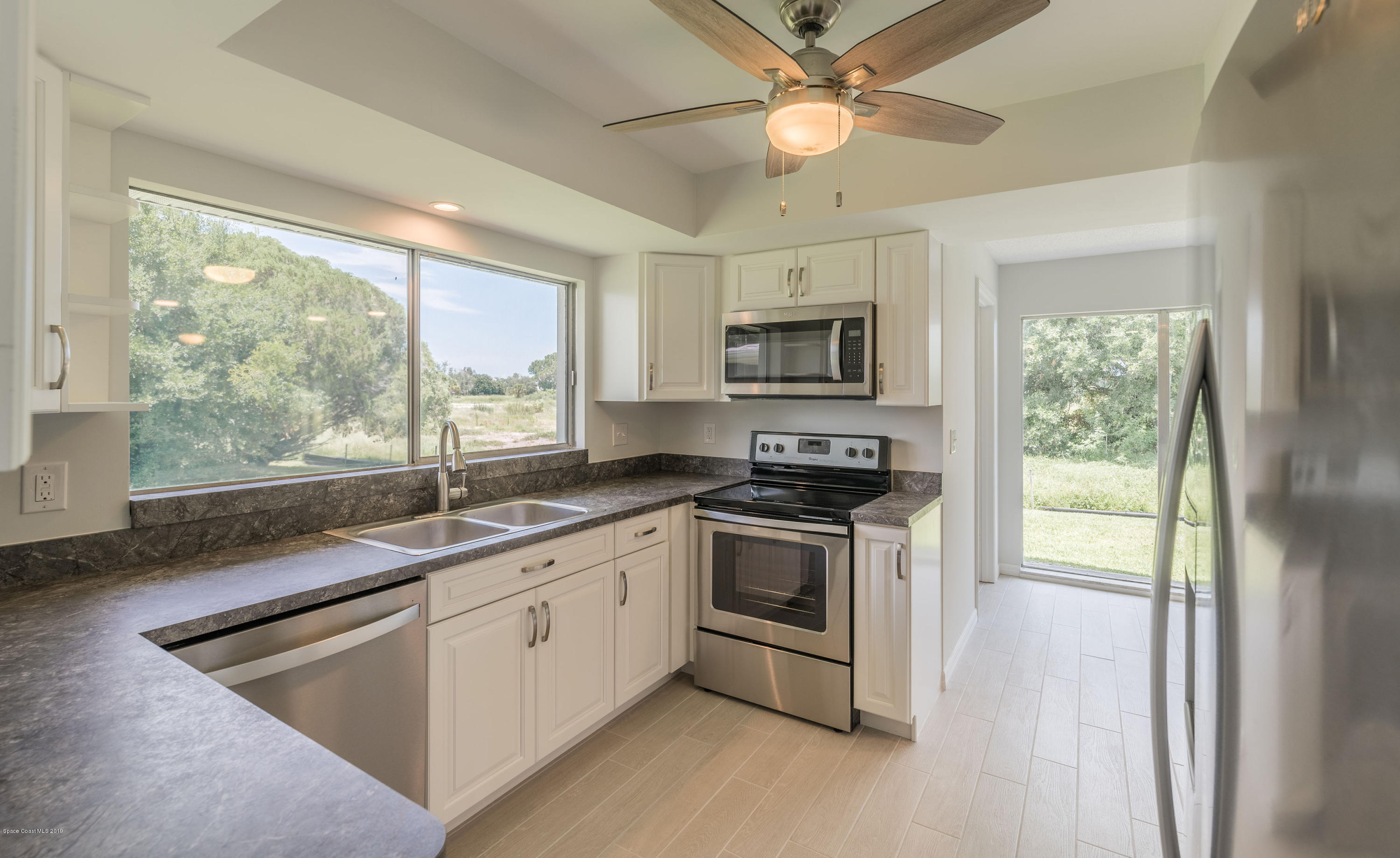 1449 Meadowbrook Road Northeast Palm Bay, FL 32905 - Photo 5 of 34 Kitchen