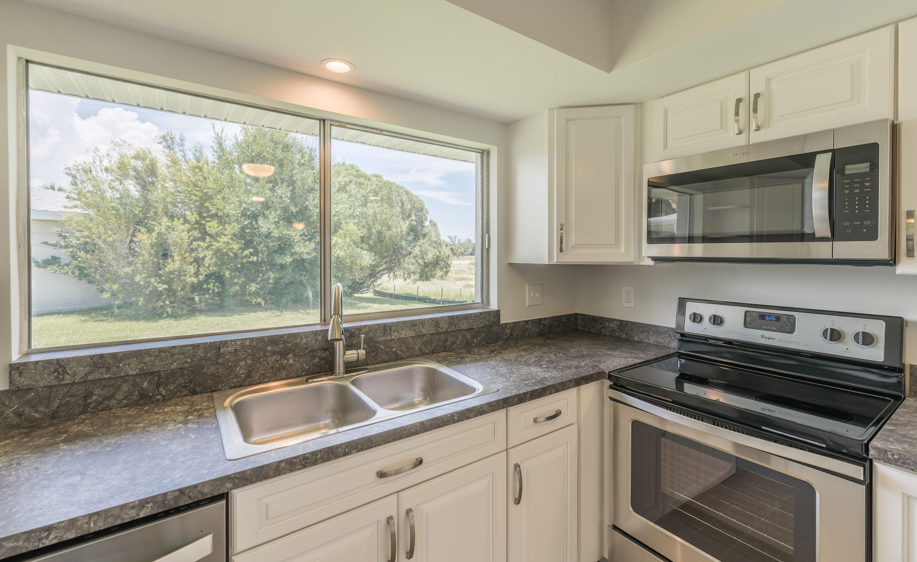 1449 Meadowbrook Road Northeast Palm Bay, FL 32905 - Photo 6 of 34 Kitchen