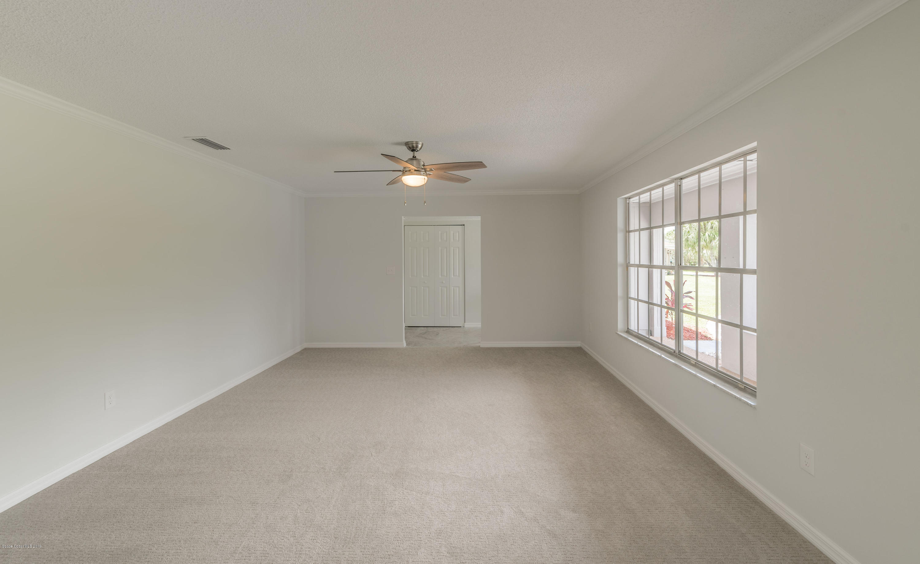 1449 Meadowbrook Road Northeast Palm Bay, FL 32905 - Photo 10 of 34 Living Room