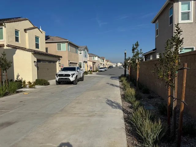 a view of a street with cars