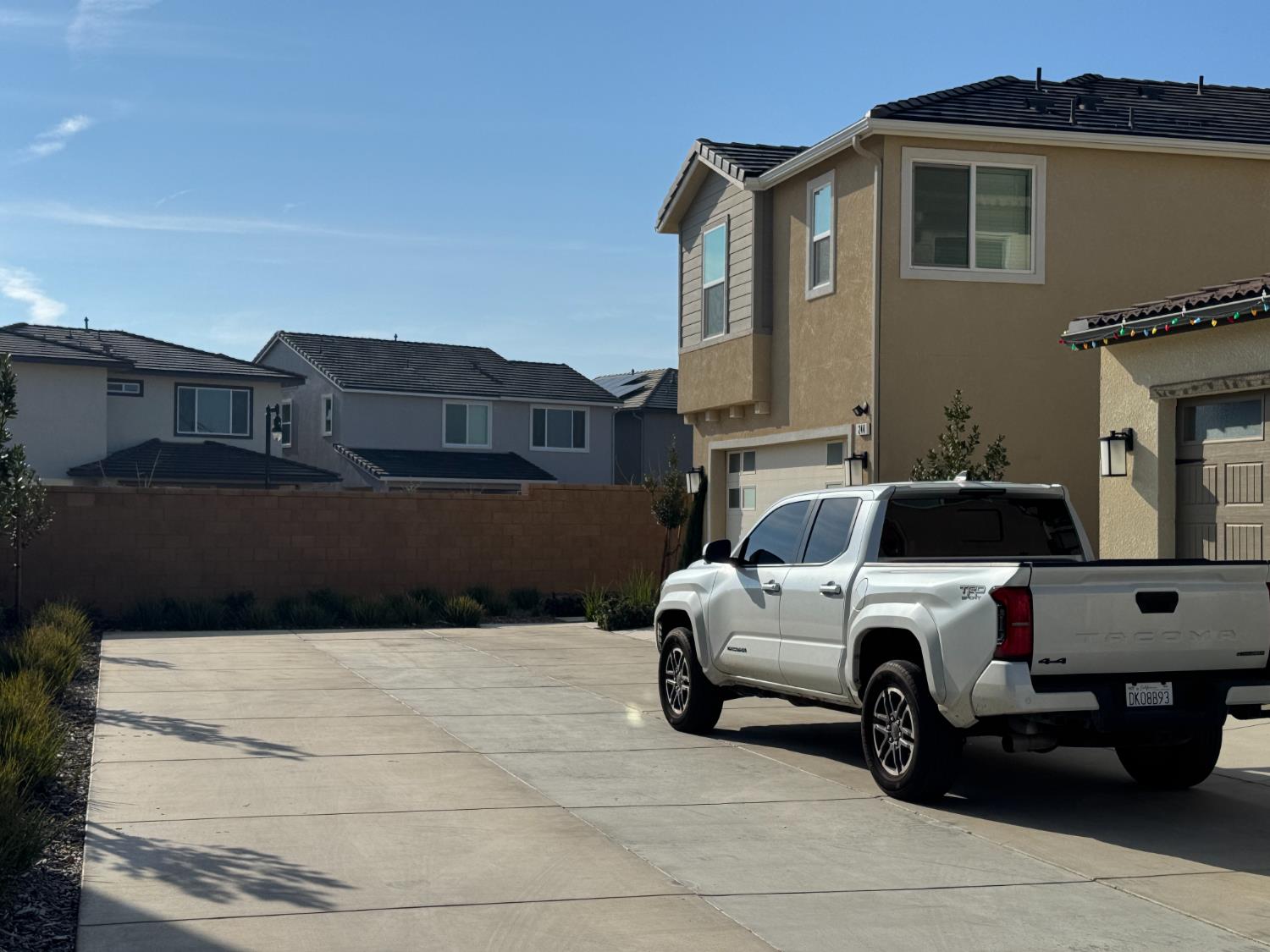 244 Arbor Drive South Madera, CA 93636 - Photo 6 of 6 a front view of a house with parking space
