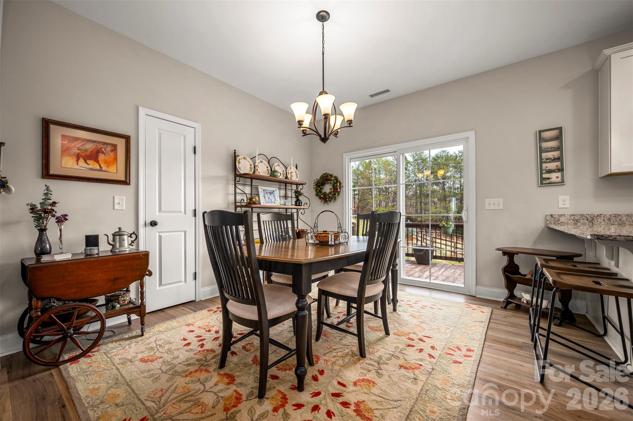 398 David Sims Road Rutherfordton, NC 28139 - Photo 17 of 48 a view of a dining room with furniture window and wooden floor