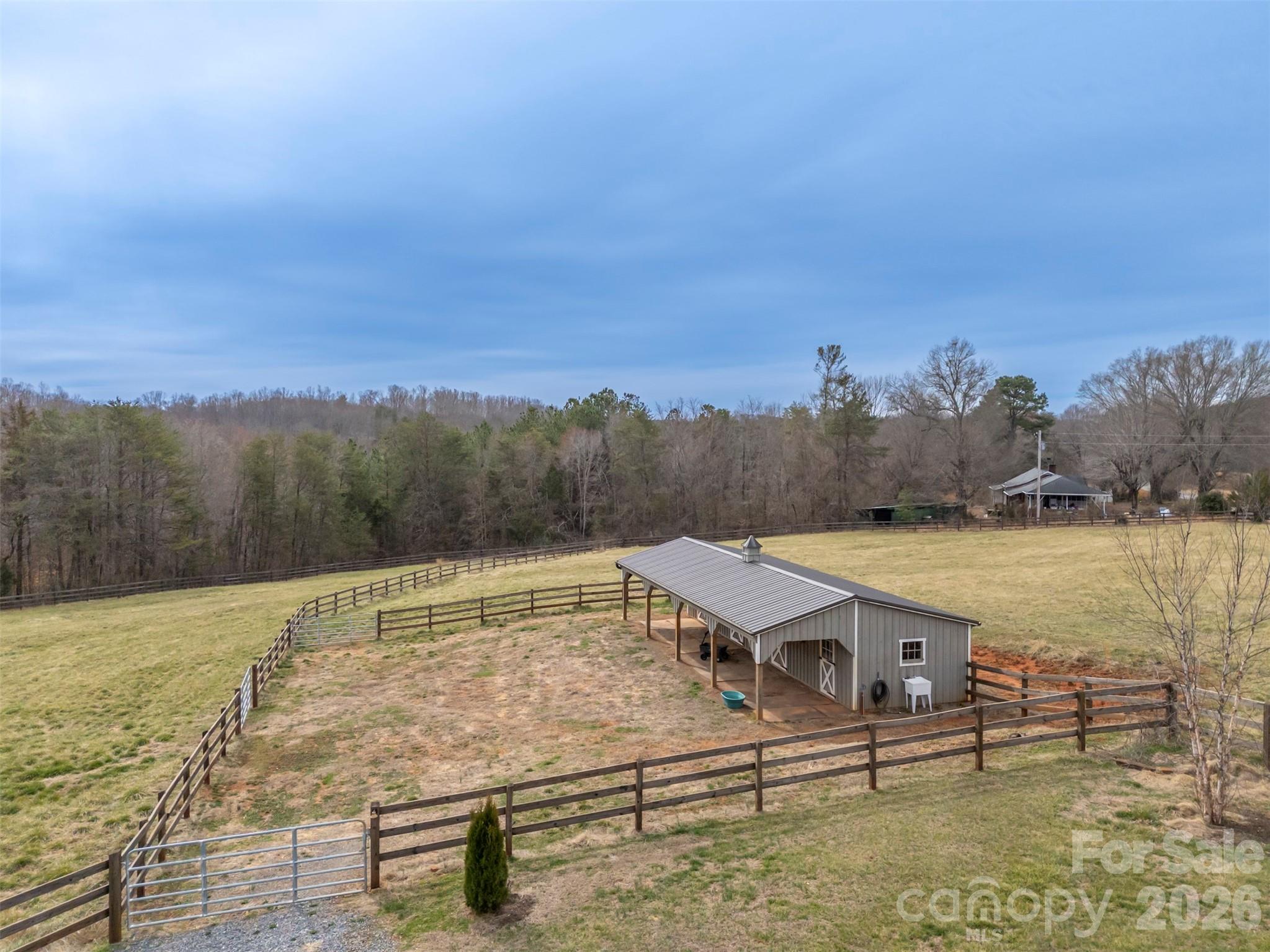 398 David Sims Road Rutherfordton, NC 28139 - Photo 29 of 48 a view of a swimming pool with lake and mountain in the back