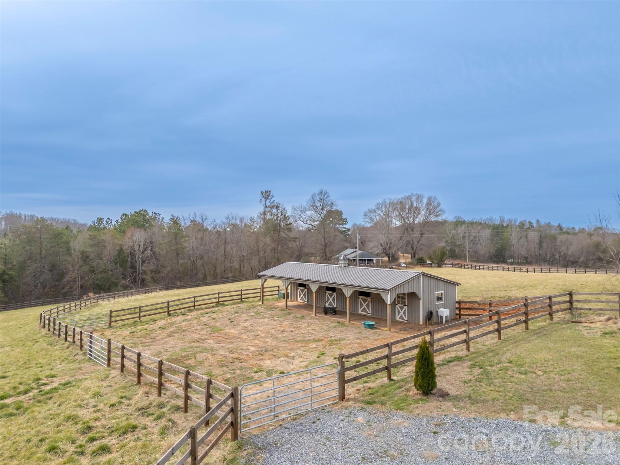 398 David Sims Road Rutherfordton, NC 28139 - Photo 3 of 48 a view of a terrace with a lake view
