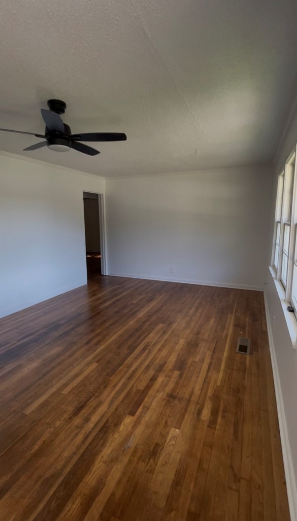 3415 Terminal Street Columbus, GA 31906 - Photo 3 of 6 a view of empty room with wooden floor