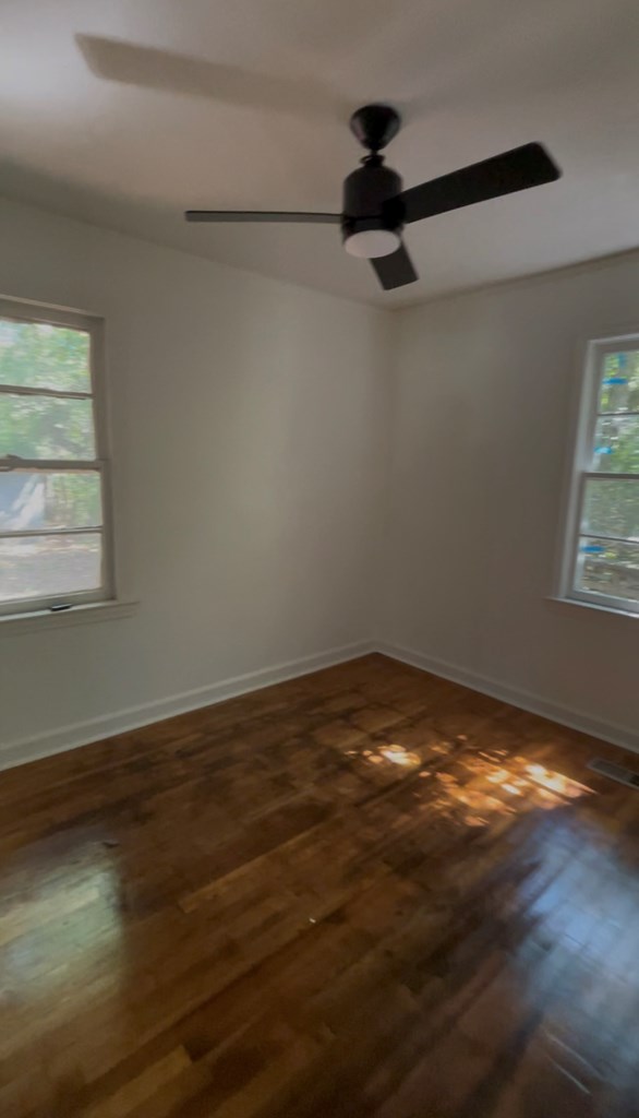 3415 Terminal Street Columbus, GA 31906 - Photo 4 of 6 a view of a room with wooden floor cabinet and windows