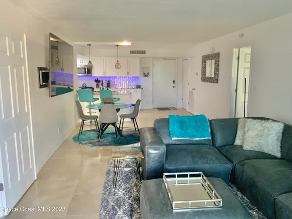 a living room with furniture and a couch