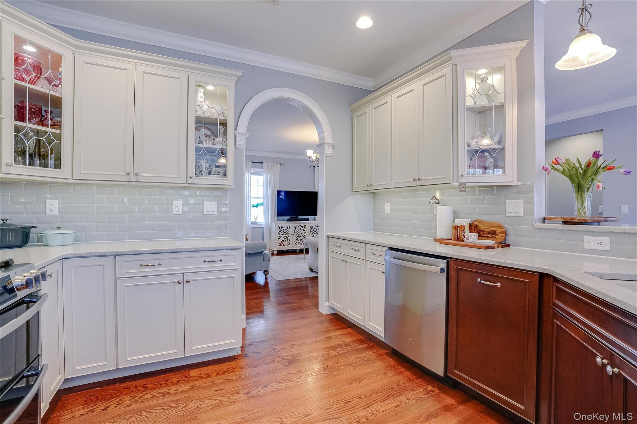 23 Swan Holw Road New Windsor, NY 12553 - Photo 13 of 34 This kitchen is designed for both everyday living and entertaining, the space offers ample prep surfaces, quality finishes, and a layout that invites gathering while elevating the heart of the home.