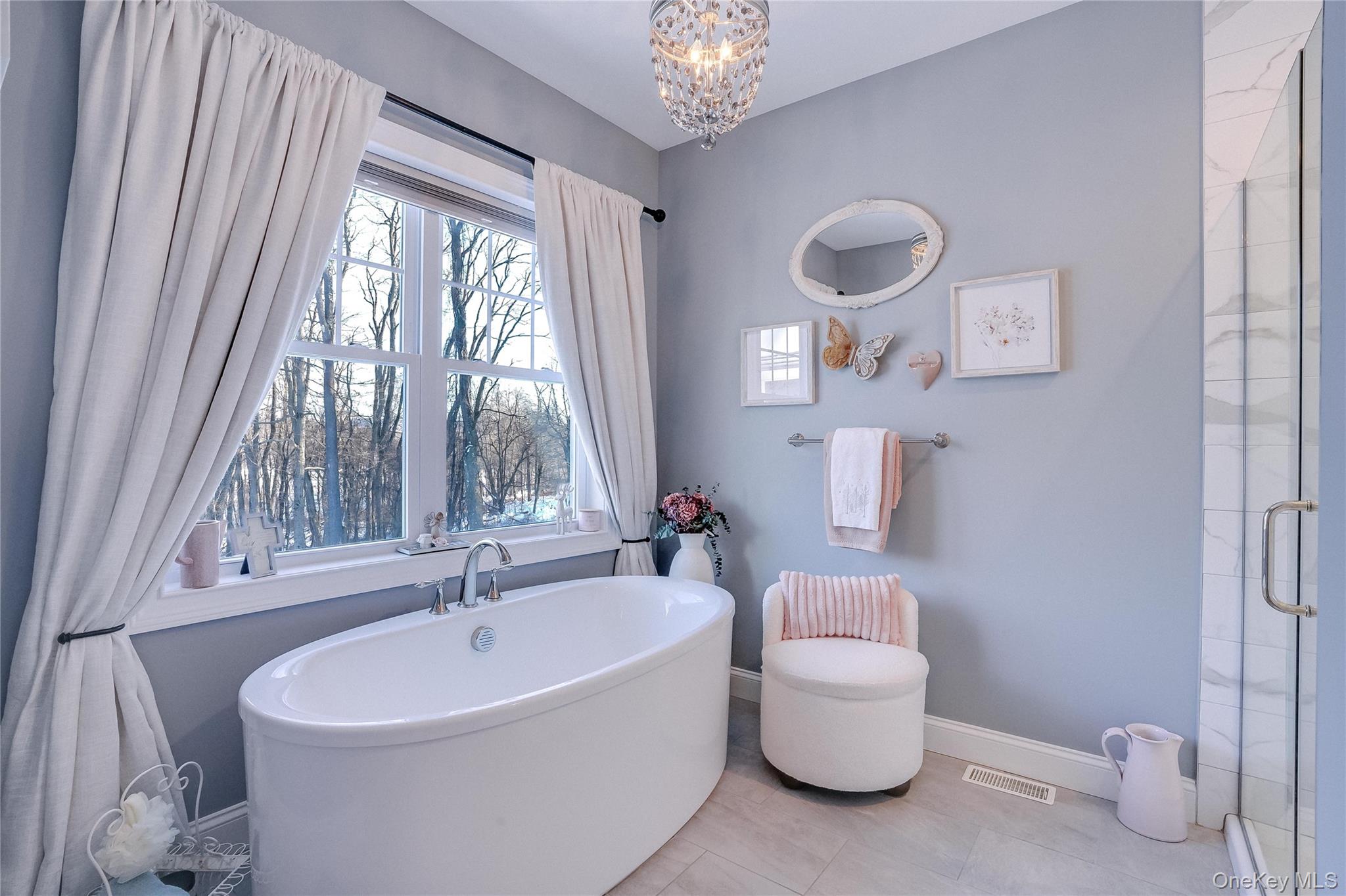 23 Swan Holw Road New Windsor, NY 12553 - Photo 22 of 34 Thoughtful design and luxurious finishes create a spa-like atmosphere, combining functionality with timeless elegance.