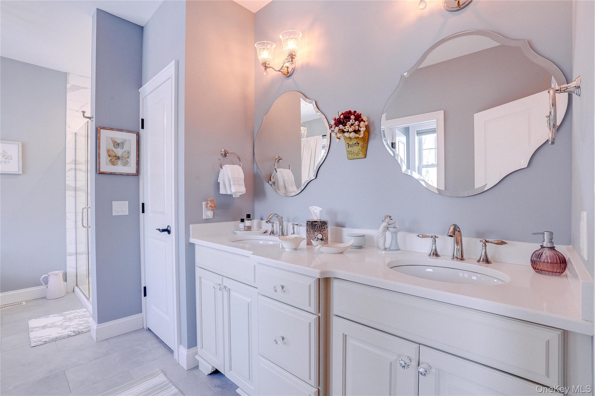 23 Swan Holw Road New Windsor, NY 12553 - Photo 23 of 34 Stunning double vanity with beautiful mirrors located in the primary bathroom.