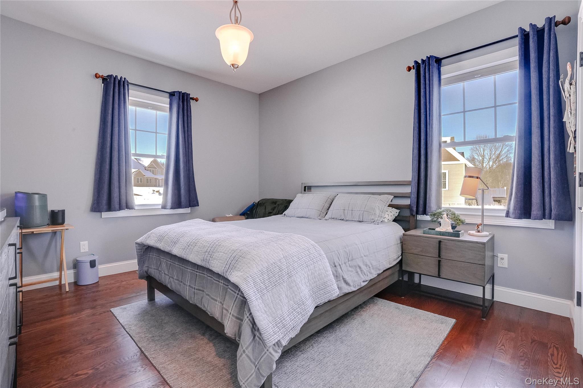 23 Swan Holw Road New Windsor, NY 12553 - Photo 25 of 34 A large bedroom offers a walk-in closet thoughtfully designed with a built-in desk, providing a perfect blend of functionality and comfort. This versatile space is ideal for work, study, or personal organization, all within the privacy of a generously sized bedroom.