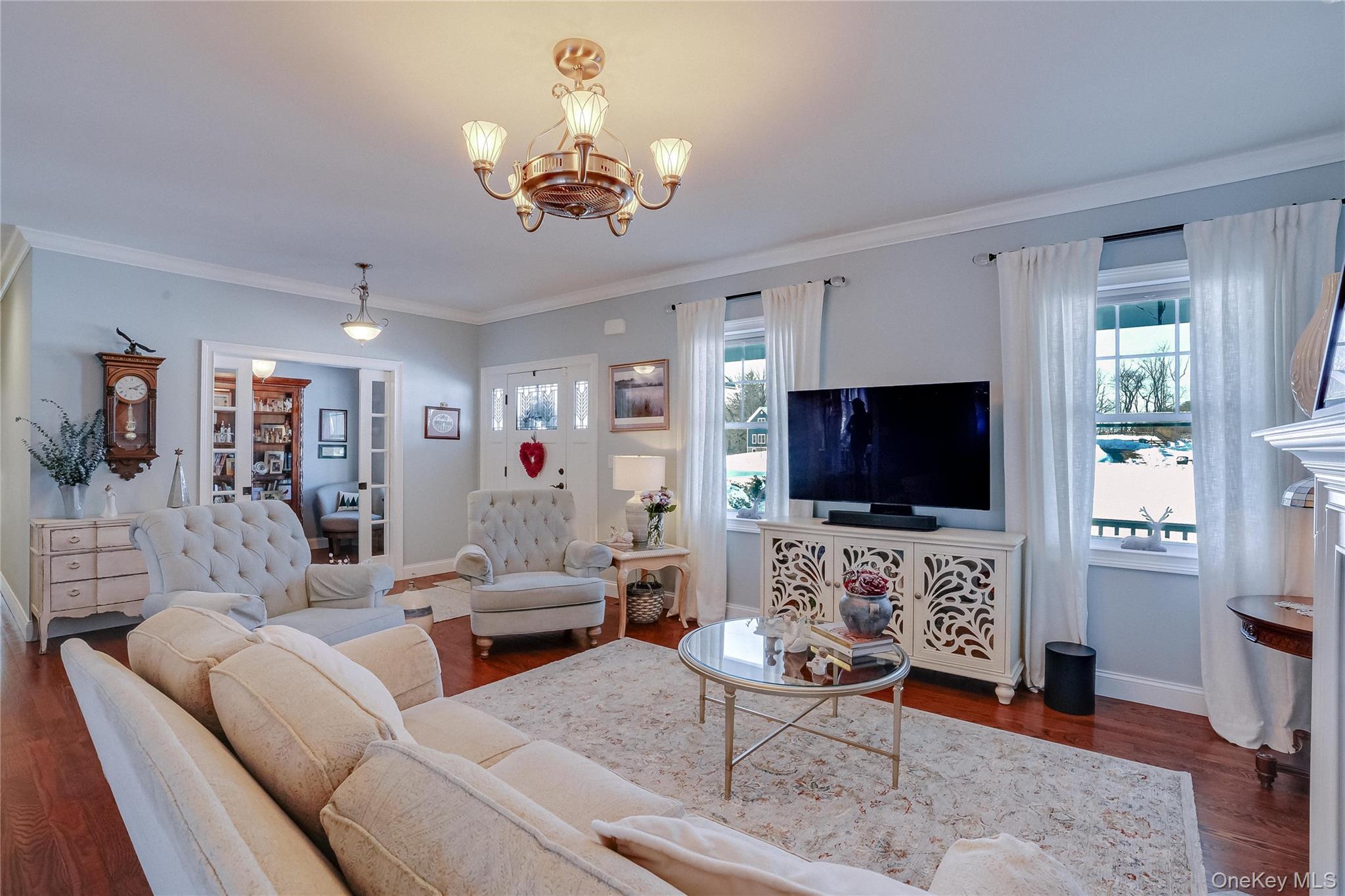 23 Swan Holw Road New Windsor, NY 12553 - Photo 8 of 34 Designed for comfort and style, the space offers a warm atmosphere for everyday living while remaining perfectly suited for entertaining. Natural light and thoughtful details come together to create a room that feels both sophisticated and welcoming.