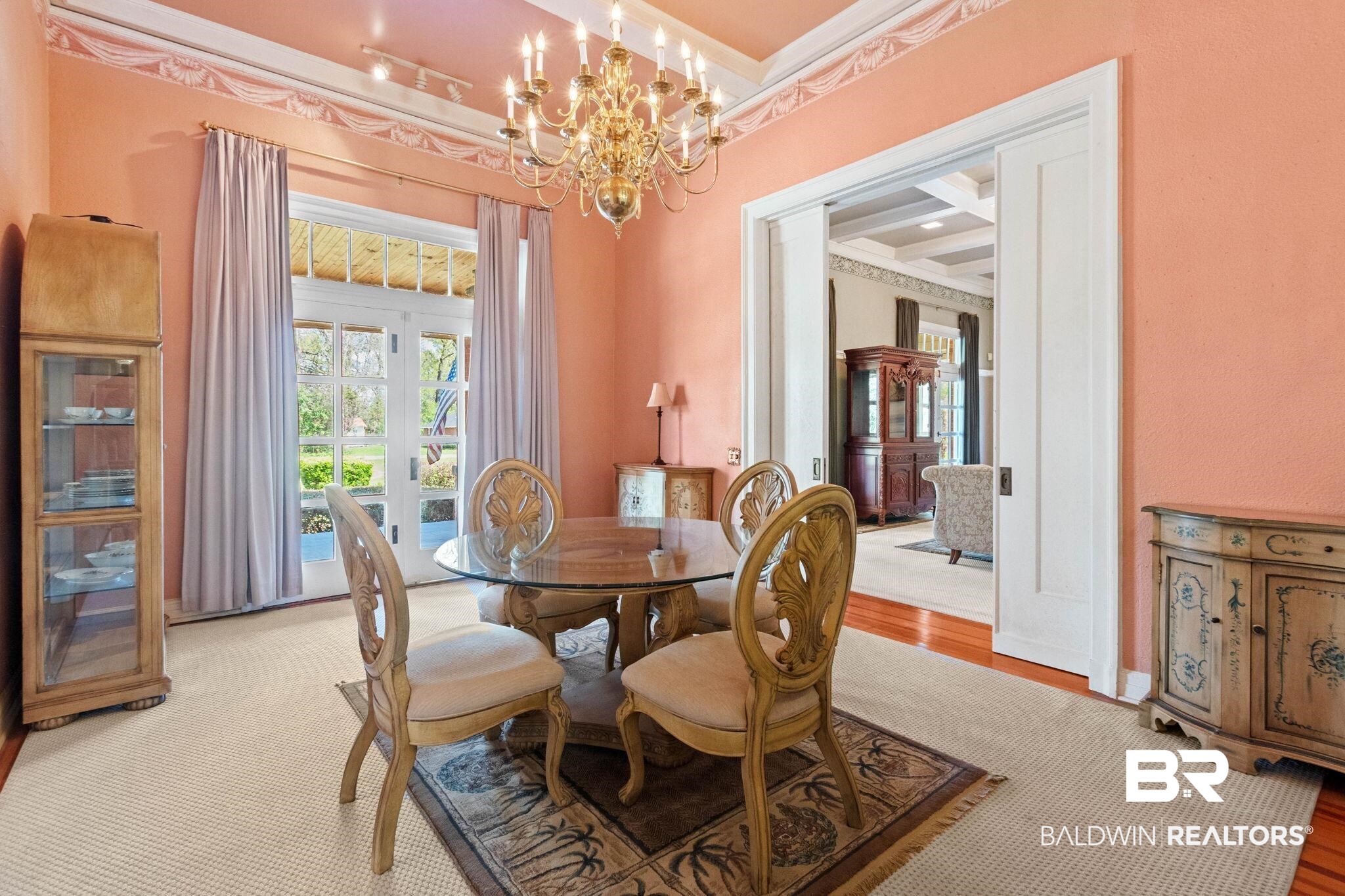 1701 Sowell Road Brewton, AL 36426 - Photo 25 of 83 Dining area featuring a chandelier, wood finished floors, and coffered ceiling