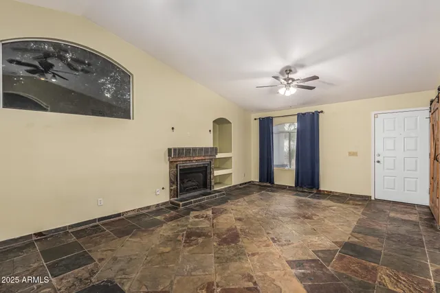 a view of livingroom with a fireplace