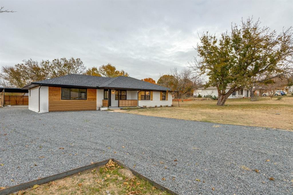 109 East 5th Street Prosper, TX 75078 - Photo 2 of 25 a front view of house with yard
