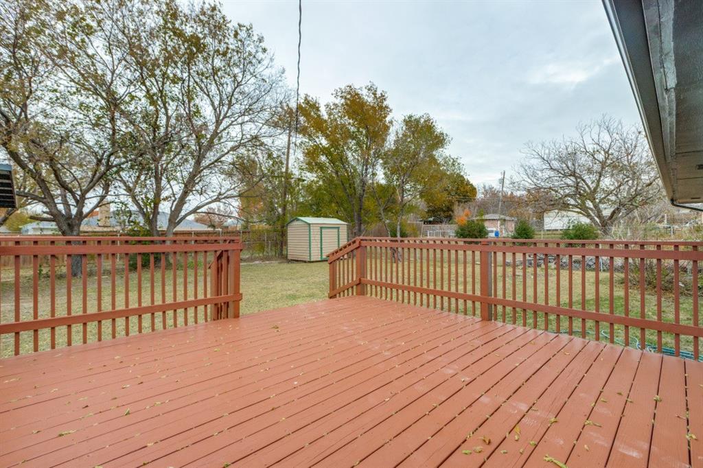 109 East 5th Street Prosper, TX 75078 - Photo 20 of 25 a balcony with wooden floor